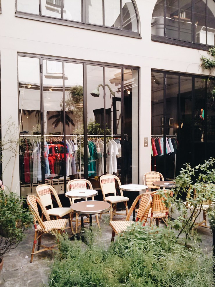Merci Paris inner courtyard rattan seating
