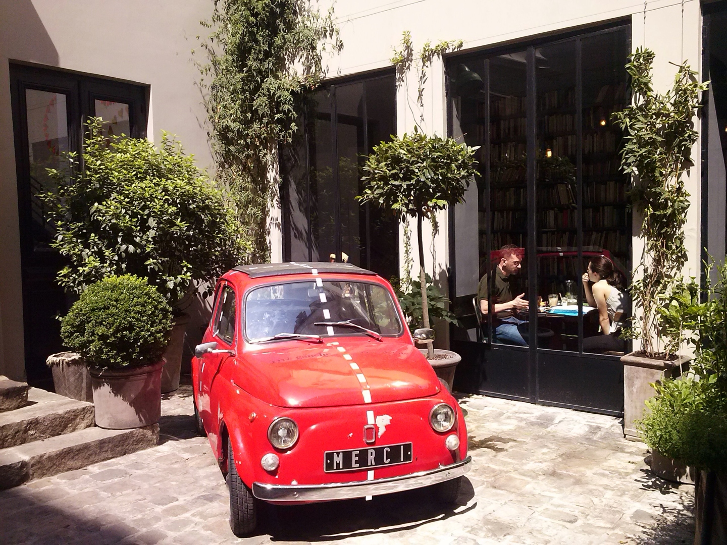 Merci Paris inner courtyard with Fiat500