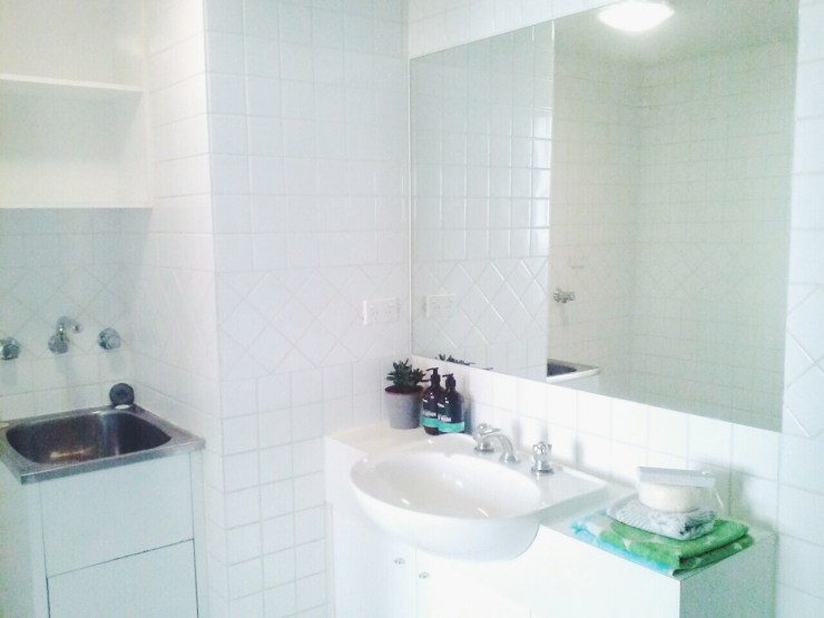 Henty House Unit 107 501 Little Collins Street Melbourne bathroom and laundry view