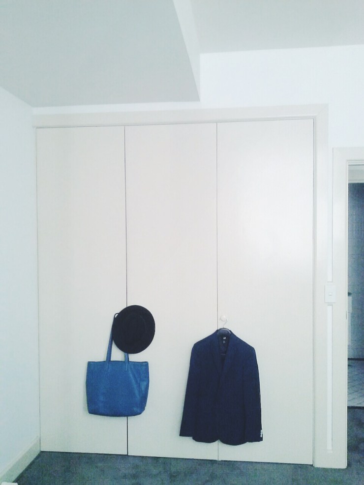 Henty House Unit 107 501 Little Collins Street Melbourne bedroom wardrobe view